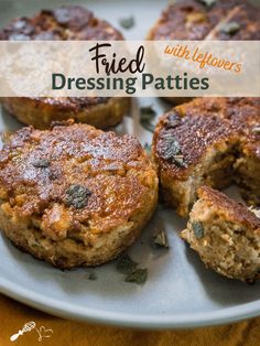 fried meat patties with lettuce and herbs on a plate