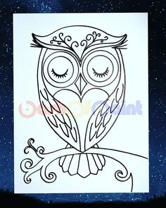 an owl sitting on top of a tree branch with its eyes closed and stars in the background