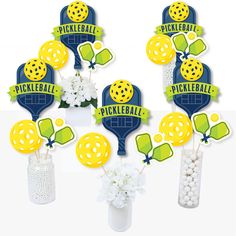 pickleball centerpieces are arranged in vases