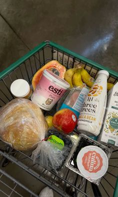 a shopping cart filled with groceries and drinks