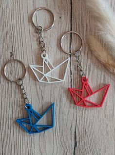 3D printed and self-constructed keychain. The perfect gift or simply a beautiful purchase for personal use. 📦 FREE Shipping! ⚙️ 1-2 days processing time 🖅 1-4 days delivery time 📏 Measurements: - Length: ~46mm - Width: ~33mm - Thickness: ~4mm Material: I only use organic polyester for my prints, which is 100% biodegradable. (PLA, plastic, plastic) Each key fob comes with a key ring and a short chain. PLA is dimensionally stable up to a temperature of 60oC. Avoid storing the figures near heat Rectangular Blue Keychain For Gifts, 3d Printed Key Chains, Japan Keychain, Keychain Japanese, Cute Japanese Keychains, Paper Boat, Keychain Bag, Origami Paper, Key Fob