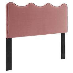 a pink headboard with black legs on a white background