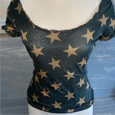 Super Cute Army Green Star T Shirt By Moschino Semi Sheer Stretchy Material Has A Super Cute Trim This Is Twisted Around The Collar/ Neck Line Lightly Used But In Excellent Condition Star T Shirt, Green Star, Collar Neck, Botanical Pattern, Star Shirt, Outfit Idea, Journal Inspiration, Stretchy Material, Army Green