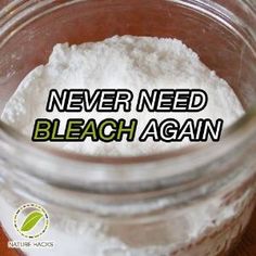 a glass jar filled with white powder on top of a wooden table next to the words never need bleach again