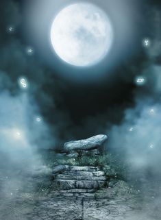 a rock formation in the middle of a foggy field with a full moon behind it