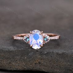 This is a Vintage Moonstone Engagement ring with Alexandrite. The photo shows in 14k rose gold. Best Gift for Engagement,wedding,birthday gift. Main stone is 6x8mm Oval Cut Moonstone,  Side stones are Moissanite + 2mm Alexandrite. I accept custom making order. Please contact me if you need this service. All the jewelry in my store is handmade.It may take 2-3 weeks to finish. For all the jewelries,there is a 14 days money back guarantee.You can return it in the time frame without any questions.Ho Engagement Rings For Virgos, Wedding Ring Sets Oval, Rose Gold Moonstone Ring, Moonstone Wedding Ring, Opal Wedding Ring Set, Rainbow Moonstone Engagement Ring, Moonstone Engagement Ring Rose Gold, Rose Gold Oval Engagement Ring, Moonstone Engagement Ring Set