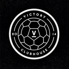 the victory club house logo in black and white with a soccer ball on it's side