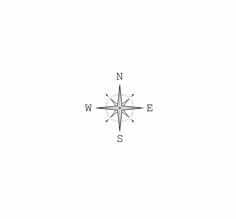 a black and white photo of a compass on a white background with the words n w e s