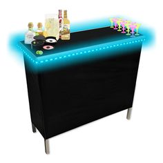 an illuminated bar with liquor bottles and candles on the top, in front of a white background