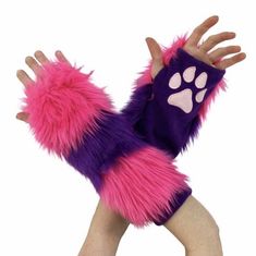 a purple and pink furry animal glove with paw prints on the front, $ 3 99