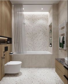 a bathroom with a toilet, sink and bathtub next to a window in the wall