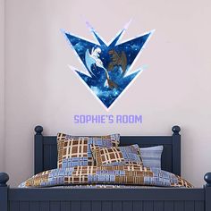 a bedroom with a bed and wall decal that says sohie's room