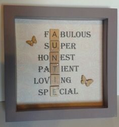 a crossword puzzle in a frame with butterflies on it