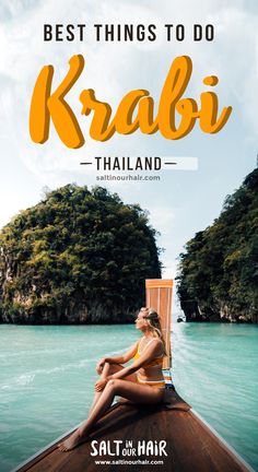 a woman sitting on top of a boat in the ocean with text overlay that reads best things to do in krabi thailand