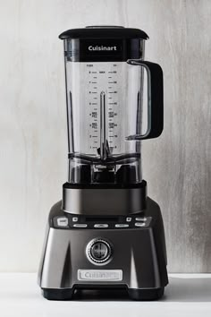 a black blender sitting on top of a counter