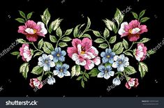 an embroidered floral design with pink, blue and white flowers on a black background stock photo