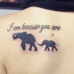 an elephant tattoo with the words i am because you are