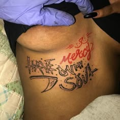 someone has written on their stomach with graffiti