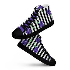 Step out in style with these bold Women's High-Top Shoes inspired by the iconic Beetlejuice color scheme! Featuring striking black and white stripes with vibrant pops of purple and green, these shoes bring a fun, edgy twist to your wardrobe. The high-top design offers a comfortable, snug fit, while the durable canvas upper and cushioned sole ensure all-day wearability. Perfect for adding a touch of playfulness to any outfit, these shoes are great for casual outings or making a bold statement. Embrace your inner Beetlejuice and stand out in these unique high-tops that blend quirky fun with everyday practicality! * 100% polyester canvas upper side * Ethylene-vinyl acetate (EVA) rubber outsole * Breathable lining, soft insole * Faux leather toe cap * Padded collar, lace-up front * Blank produ Striped Low-top Sneakers For Streetwear, Womens High Top Shoes, High Top Shoes, Beetlejuice, Shoes Trainers, Snug Fit, Womens Shoes Sneakers, High Tops, Athletic Shoes