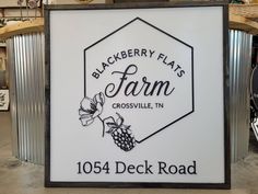 the sign for blackberry flats farm in crossville, tn is displayed on display at the store