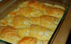 a casserole dish filled with cheesy potatoes