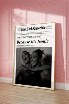 an advertisement for new york's chronice is displayed in front of a pink wall