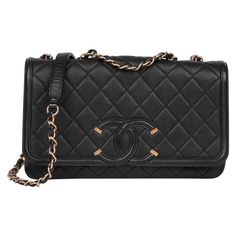 CHANEL Black Quilted Caviar Leather Medium Filigree Flap Bag Serial Number: 22644549 Age (Circa): 2017 Accompanied By: Chanel Dust Bag Authenticity Details: Serial Sticker (Made in Italy) Gender: Ladies Type: Shoulder, Crossbody Colour: Black Hardware: Gold Material(s): Caviar Leather Interior: Burgundy Leather Closure: Button Height: 17cm Width: 26cm Depth: 6cm Strap Drop: Single: 53cm Double: 28cm -The exterior is in excellent condition with light signs of use. -The interior is in excellent co Chanel Crossbody Bag, Chanel Crossbody, Structured Shoulder, Chanel Vintage, Handbags Online, Black Quilt, Chanel Black, Black Hardware, Coco Chanel