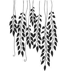 some black and white leaves hanging from the ceiling