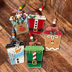 christmas ornaments are arranged on a wooden floor