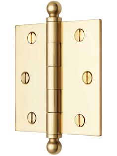 a brass plated door hinge with three knobs