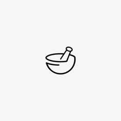 a black and white drawing of a bowl with a spoon in it