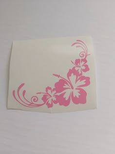 a piece of paper with pink flowers on it