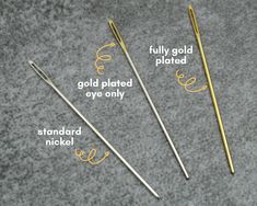 four knitting needles labeled in different ways