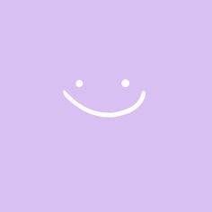 a purple background with a smiley face drawn on the bottom right corner and two white dots in the middle