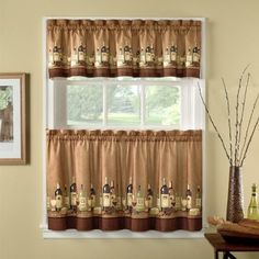 a kitchen window curtain with wine bottles on it