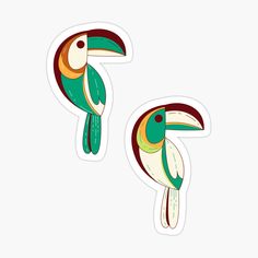 two stickers depicting toucans with colorful designs on their faces and beaks