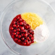 pomegranates and sugar in a glass bowl