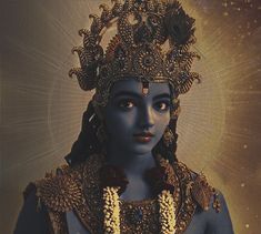 a woman dressed in blue and gold with an ornate crown on her head, surrounded by stars