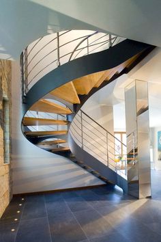 a spiral staircase in a modern home