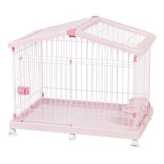 a small pink bird cage with wheels