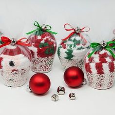 six red and white christmas baubles with bows on them