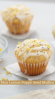 mini lemon poppy seed muffins with white frosting and sprinkles