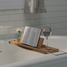 Relaxing bathtub with tub caddy, wine glass and book on top Console Designs, Bathroom Things, Wood Bathtub, Bath Rack, Tub Tray, Bathtub Caddy, Bathtub Tray, Wood Bath, Wooden Bath