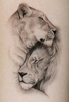 a drawing of two lions on the back of a woman's leg