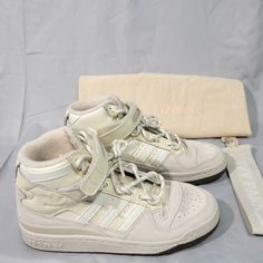 New, Never Worn (No Box) *See Pictures. Adidas X Ivy Park Forum Mid 'Icy Park Cream White' High Top Sneakers. Size: 5 Women’s Comes With Dust Bag & Strap Style: Gw2857 Colorway: Alumin/Cream White/Gum * Smoke-Free Home Thank You For Looking Let Me Know If You Have Any Questions. Check Out My Other Items Cream High-top Lace-up Sneakers With Boost Midsole, High-top Sneakers With Laces And Medium Fit, Cream High-top Sneakers With Laces, Sporty Cream Lace-up High-top Sneakers, Medium Fit High-top Sneakers With Laces, Cream Lace-up High-top Sneakers For Streetwear, Cream Lace-up Basketball Shoes With Boost Midsole, Cream Sporty Basketball Shoes For Streetwear, Custom Cream High-top Sneakers With Laces