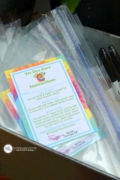 there are some pens and paper on top of a box with instructions for the day care instructions