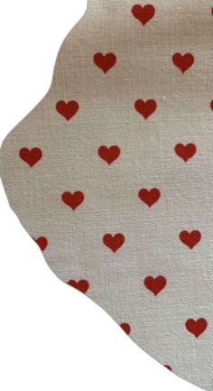 a red and white heart pattern on fabric