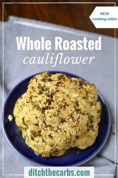 a close up of a plate of food with text overlay that reads whole roasted cauliflower