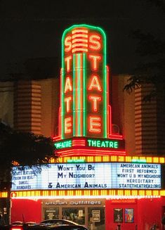 the state theatre is lit up at night