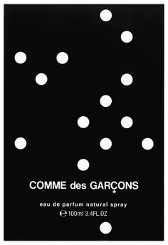 a black and white photo with dots on it that says comme des garcos